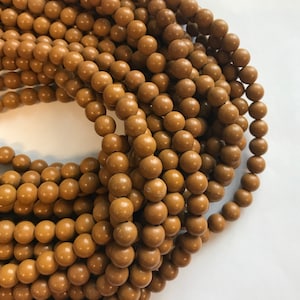 Yellow Jasper 6mm Round Natural Gemstone Bead--15.5 inch strand-
