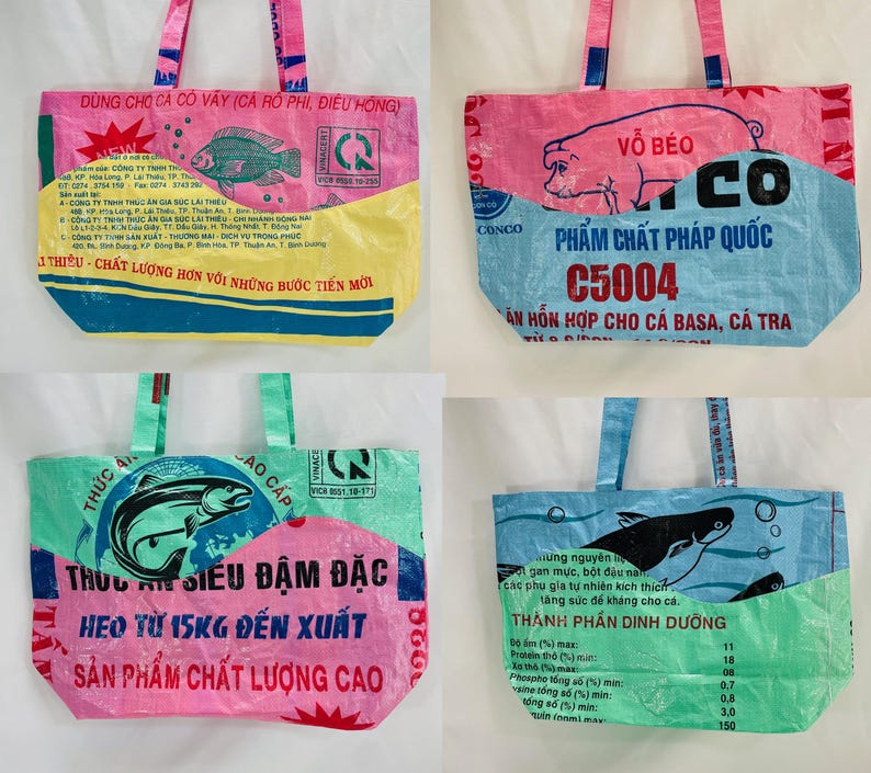 May include: Four colorful tote bags made from recycled plastic bags. The bags feature different designs, including a fish, a pig, and a catfish. The bags are all pink, blue, green, and yellow.