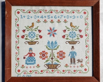 Vintage handmade cross stitch sampler, framed and signed, from 1964, folk art textile