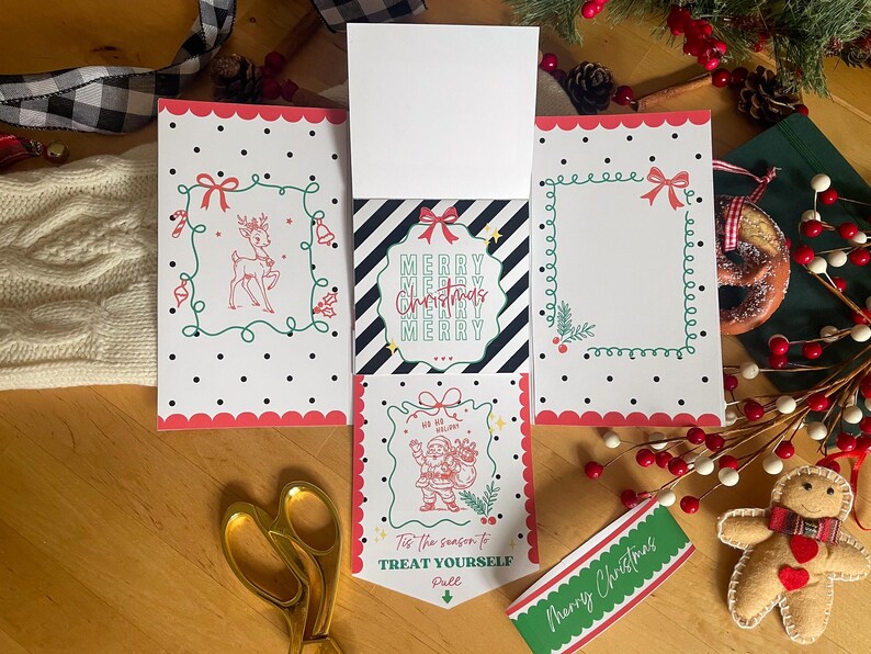 May include: Christmas-themed greeting cards with red scalloped edges, featuring festive illustrations and the text "Merry Christmas." The cards are decorated with reindeer, Santa Claus, and decorative frames. A green and red "Merry Christmas" tag is also visible.