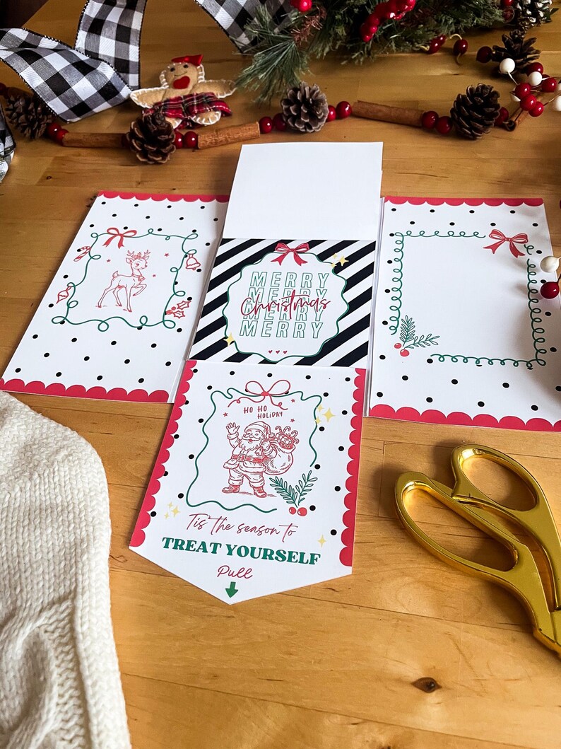May include: Christmas-themed greeting cards with red and black polka dot borders, featuring illustrations of a reindeer, Santa Claus, and the text "Merry Christmas." The cards are displayed on a wooden surface with decorative elements.