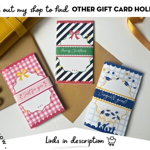 May include: Gift card holders with decorative designs. One pink holder has a gingham pattern and the text "Just for you." Another has a red and black striped pattern with "Merry Christmas." A blue holder says "Congrats grad!"