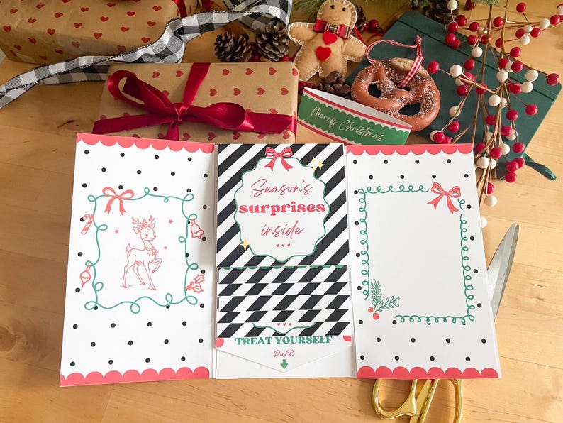 May include: Christmas-themed gift cards with a pink scalloped edge, black polka dots, and decorative frames. One card reads "Season's surprises inside" and "Treat Yourself". Other holiday items include wrapped gifts, a gingerbread man, and scissors.