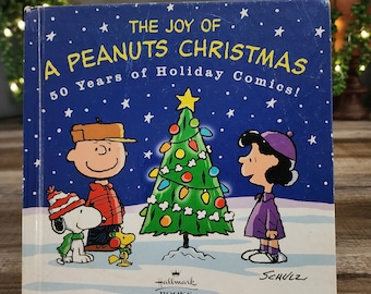 The Joy of a Peanuts Christmas, book by Charles Schulz, 50 Years of Holiday Comics! Hallmark Books, Comics from the 50's to the 90's