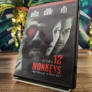 "12 Monkeys DVD, ""Post-Apocalyptic Future Devastated by Disease""."