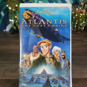 Disney&#39;s Atlantis The Lost Empire VHS, Archeologists and Explorers are led by Historian Milo Thatch, Board Ulyses and Head Deep into the Sea