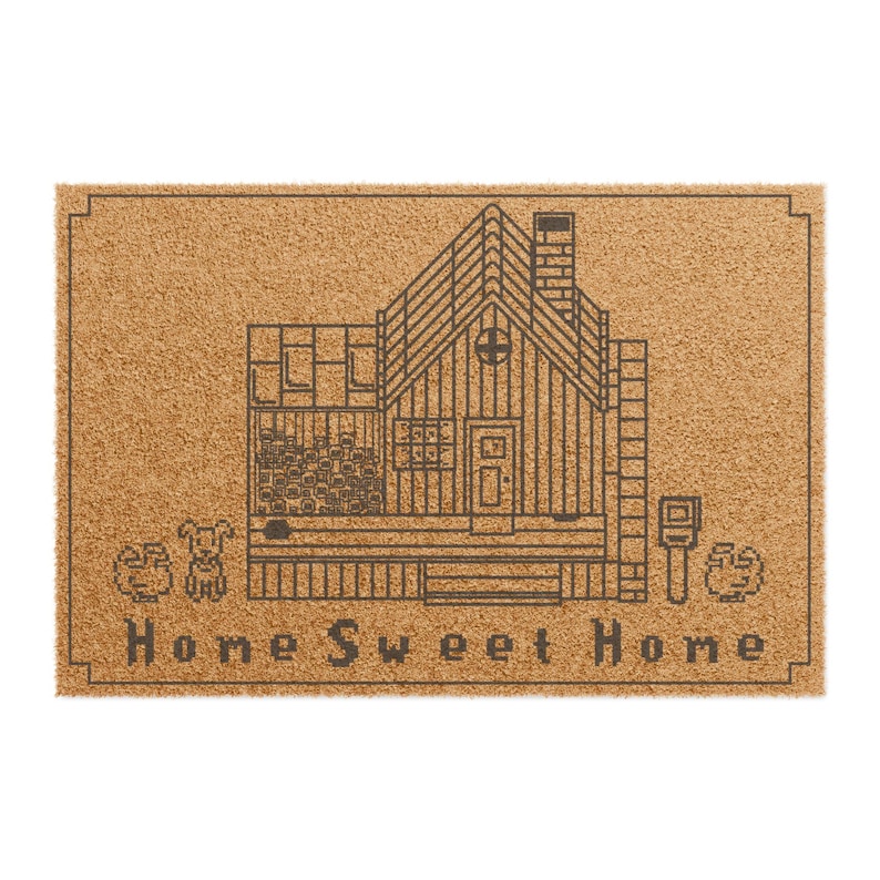 May include: A rectangular doormat with a brown background and a black line drawing of a house, dog, and mailbox. The words "Home Sweet Home" are printed in black at the bottom of the mat.