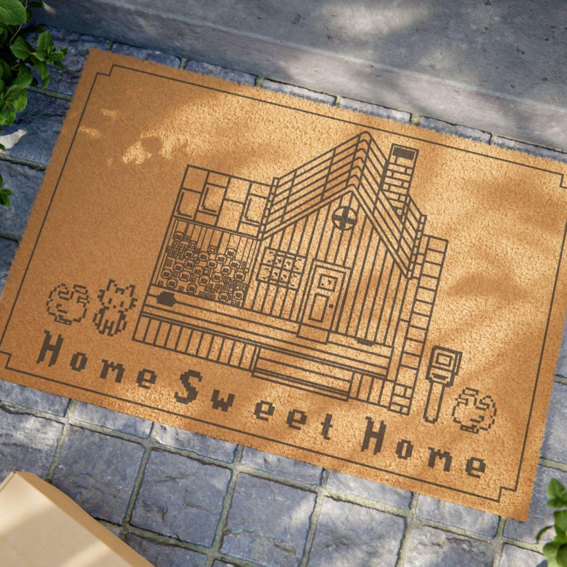 Stardew Valley Coir Natural Doormat Rug with pixel house, chickens and cat and the text "Home Sweet Home" in pixel font.
