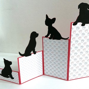 Carte pour chiots , Accordéon , Intérieur vierge , Empreintes de pattes , Rouge , Bleu , Noir , Silhouette , Animal de compagnie