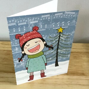 Carte d'enfant chantant , Intérieur vierge , Imprimé , Arbre , Étoile , Hiver , Noël , Neige , Musique , Notes