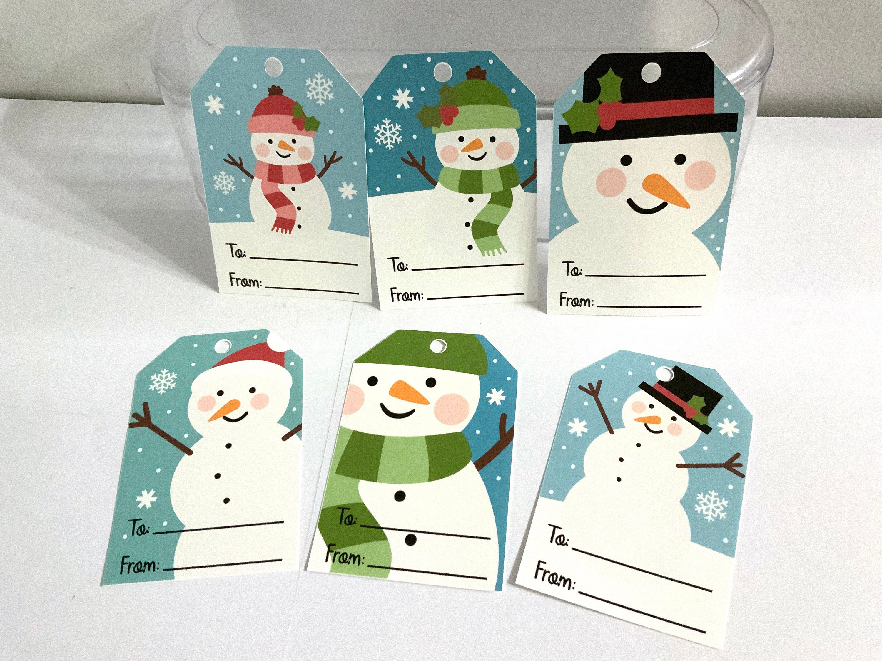 snowman gift tags , printed , snow , frost , carrot , top hat , holidays ,  jolly , festive , kids, adults , family , friends