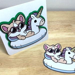 Carte autocollante flottante Corgi dans une licorne, piscine, amusement, été, mignon, chien, cadeau, lunettes de soleil