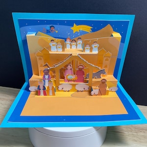 Carte de voeux pop up , vacances , écurie , bébé , mouton , âne , marie , sages , anges