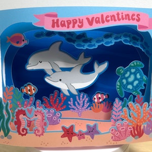 Carte de Saint-Valentin 3D pop-up dauphin, hippocampe, amour, cœurs, enfants, tortue, poisson, poisson-clown