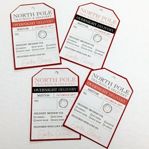 Mots-clés de livraison Pôle Nord , Suivi , Du jour au lendemain , Rouge , Noir , Père Noël , Enfants , Adultes , Noël , Cadeaux , Amour