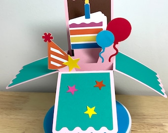 Happy Birthday Pop Up Box Card , Rainbow Cake , Balloons , Party Hat , Stars , Candle