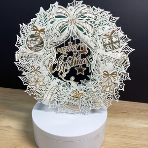 Carte de guirlande de joyeux Noël, renne, feuille d'or, décorations, noeud, hiver, étoile
