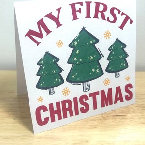 Première carte de Noël , bébé , animaux de compagnie , arbre , neige , vacances , festif , famille , ami