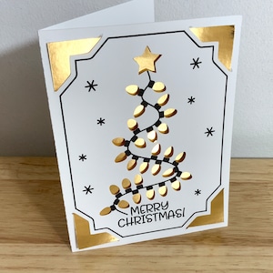 Carte Joyeux Noël avec sapin lumineux, Ampoules, Lumineux, Festif, Étoile, Neige, Famille, Ficelle