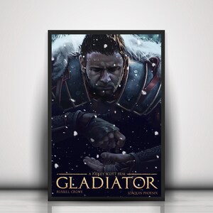 Könnte beinhalten: Ein Filmplakat für den Film Gladiator mit Russell Crowe und Joaquin Phoenix. Das Plakat zeigt eine Nahaufnahme von Russell Crowes Gesicht, mit Schnee, der um ihn herum fällt. Der Titel des Films steht in großen, fetten Buchstaben am unteren Rand des Plakats.