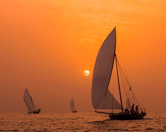 Dubai - Traditional Dhows sailing in the Arabian Gulf at sunset - SKU 0001