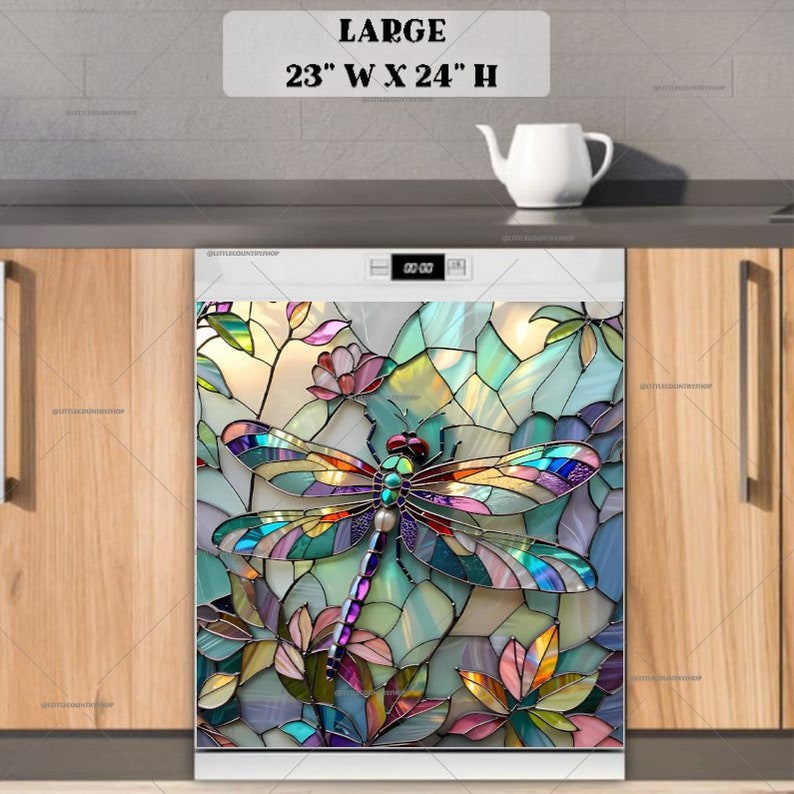 May include: A colourful stained glass dragonfly design on a white dishwasher door. The design features a dragonfly with blue, green, red, and yellow wings, surrounded by flowers and leaves. The dishwasher is 58.4 cm wide and 61 cm high.