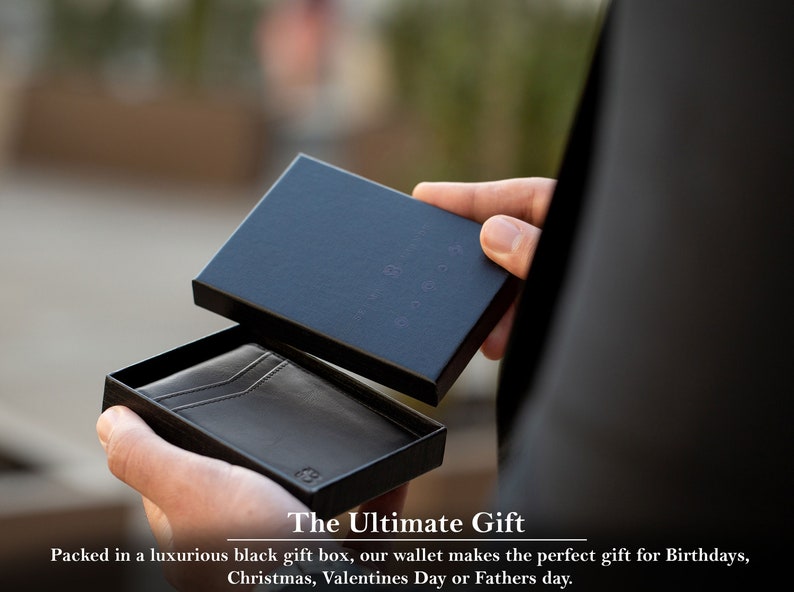 May include: A black leather wallet in a black gift box. The Ultimate Gift. Packed in a luxurious black gift box, our wallet makes the perfect gift for Birthdays, Christmas, Valentines Day or Fathers day.