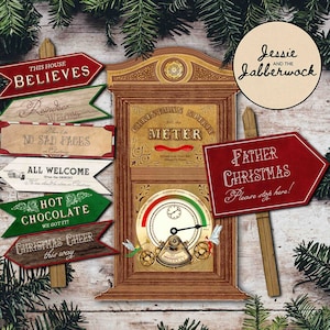May include: A set of Christmas-themed signs with festive messages such as "This House Believes", "Reindeer Welcome", "No Sad Faces", "All Welcome", "Hot Chocolate", and "Christmas Cheer this way". The signs are decorated with red, green, and gold accents and feature a vintage style. There is also a sign that says "Father Christmas Please stop here!" and a vintage-style Christmas Spirit Meter.