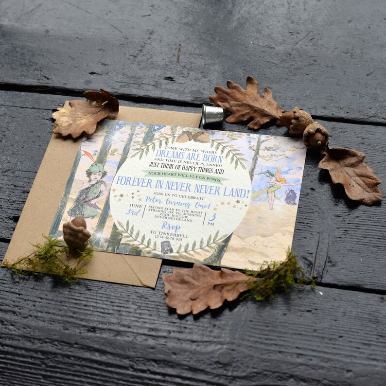 May include: A whimsical invitation for a first birthday party with a Peter Pan theme. The invitation features a watercolor illustration of Peter Pan and Tinkerbell in Neverland, with the text "Come with me where dreams are born and time is never planned. Just think of happy things and your heart will fly on wings. Forever in Never Never Land!" and "Peter turning One!" The invitation is decorated with stars, leaves, and a brown envelope.