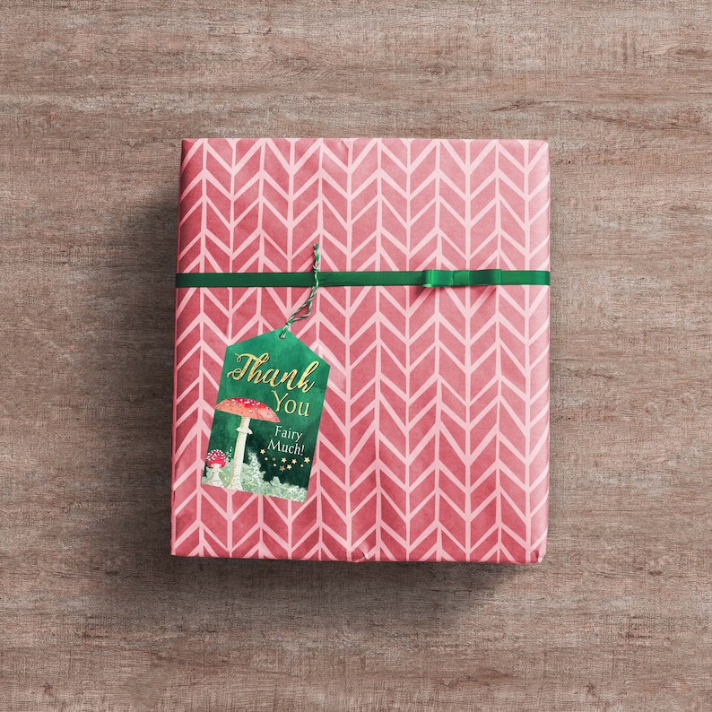 May include: A pink gift box with a green ribbon and a green and gold gift tag that says "Thank You Fairy Much!" with a mushroom illustration.
