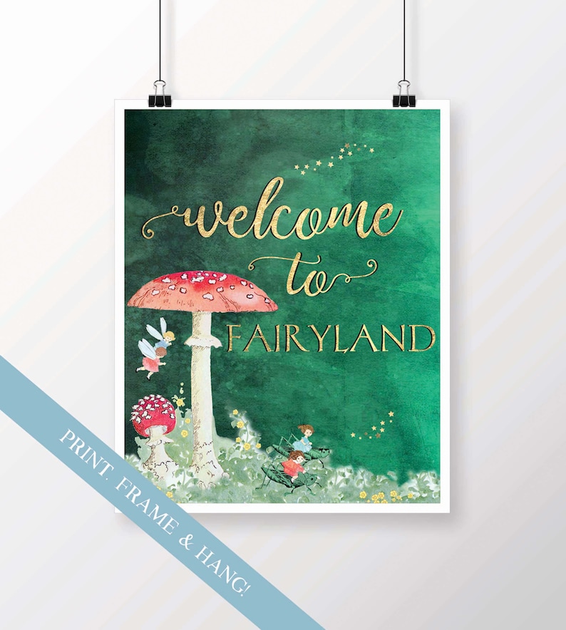 May include: A green watercolor background with gold lettering that says "welcome to FAIRYLAND". There is a large red and white mushroom with white spots and a smaller red and white mushroom with white spots. There are two fairies flying near the mushrooms and two fairies sitting on a large green beetle.