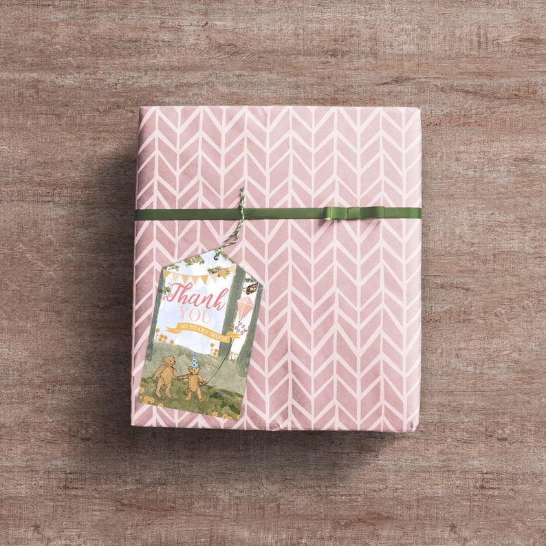 May include: Pink gift box with a green ribbon and a thank you tag with two bears and the text "Thank You So Bearly Much".