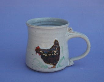 Hand thrown stoneware Mug, cup with raised chicken motif