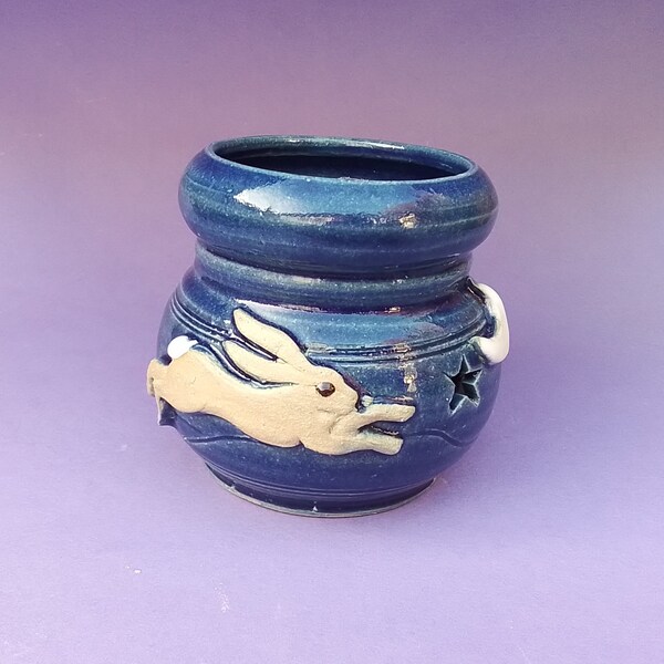 Oil burner, vaporiser, with running hare, crescent moon and cutout stars ,handthrown stoneware pottery ceramic approx 9cm x 11cm