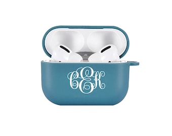 May include: Teal blue silicone case for Apple AirPods with a white monogram of the letters "C&K" on the front.