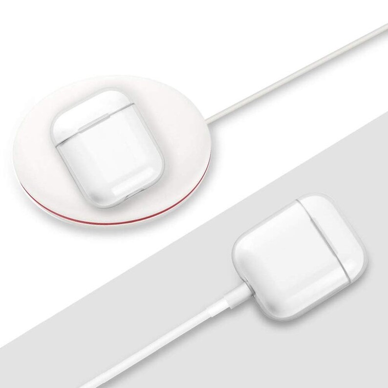 May include: A white wireless charging pad with a white wireless charging case for earbuds on top of it. A white charging cable is connected to the charging case.