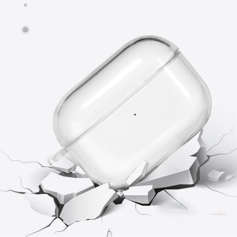 May include: A clear plastic case for wireless earbuds, shown falling onto a cracked surface. The case is designed to protect the earbuds from damage.