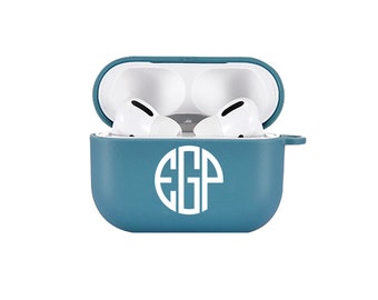 May include: Teal blue silicone case for AirPods with a white monogram of the letters "EGP" in a circle.