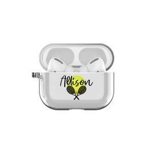 May include: A clear plastic case for wireless earbuds with a tennis ball and rackets design and the name "Alison" printed on the front.