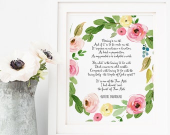 May include: A watercolor print with a floral wreath surrounding a poem about motherhood. The poem reads "Nothing is so old...the fourth of these Arts." - Adrienne Rich