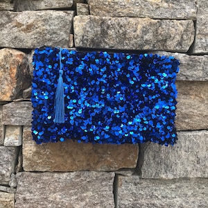 Small royal blue sequined ceremonial clutch
