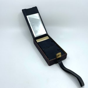 Trousse de maquillage antico portatile in cuoio aperto a due scomparti e con scomparti multipli