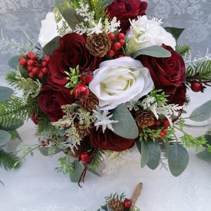 Winter Brides Burgundy Ivory Silk wedding bouquet Roses Eucalyptus Berries Pine cones Bridesmaids Winter  Grooms Buttonhole Cake flowers