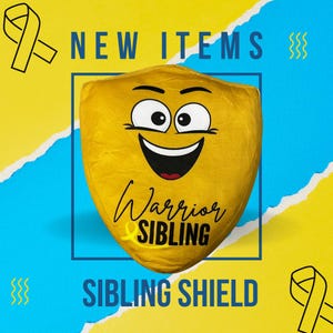 May include: Yellow plush shield with a smiling face and the text "Warrior Sibling" in black. The shield is on a yellow and blue background with the text "New Items" and "Sibling Shield" in black.