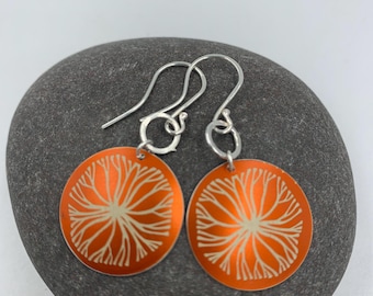 Orange circle aluminium earrings with tree design and silver ring