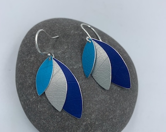 3 layered parrot wing earrings in blue and turquoise