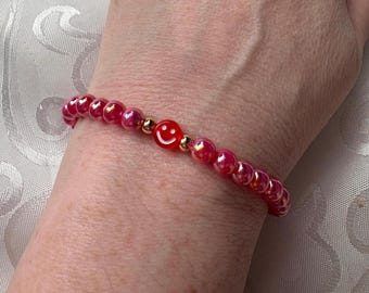 Red Smiley Face Bracelet: Gold & Acrylic Beaded Charm