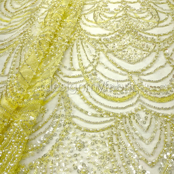 Free shipping. Yellow sequined lace fabric with beads #200360