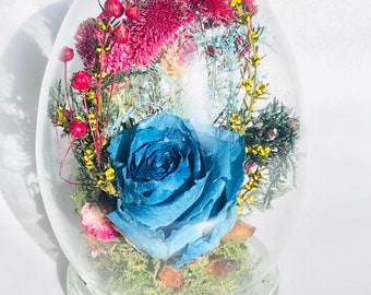 Real preserved blue rose terrarium with preserved flowers, preserved moss, and citrine crystals