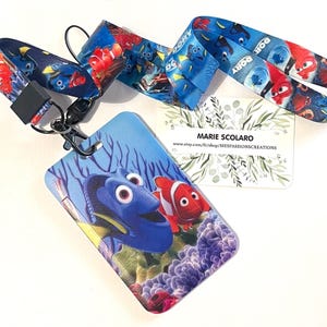 DUO Tour de cou, cordon porte clefs, carte de bus + porte carte assorti    THème Némo